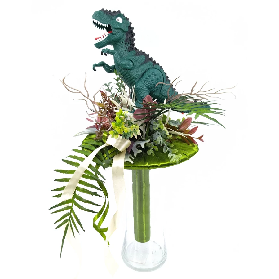 Ballagási csokor zöld Tyrannosaurus dínóval, zöld csokortartóval, műzöldekkel